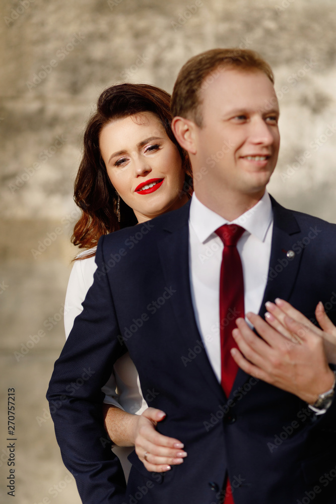 Bride and Groom on Wedding Day in city.