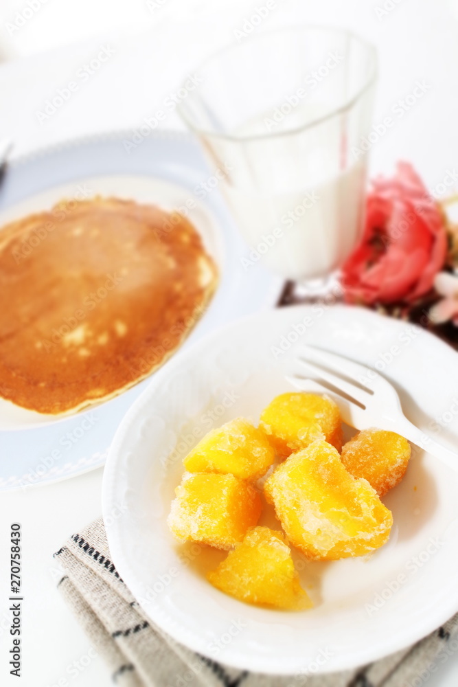 Frozen mango on bowl fro healthy breakfast image Frozen mango on bowl fro healthy breakfast image