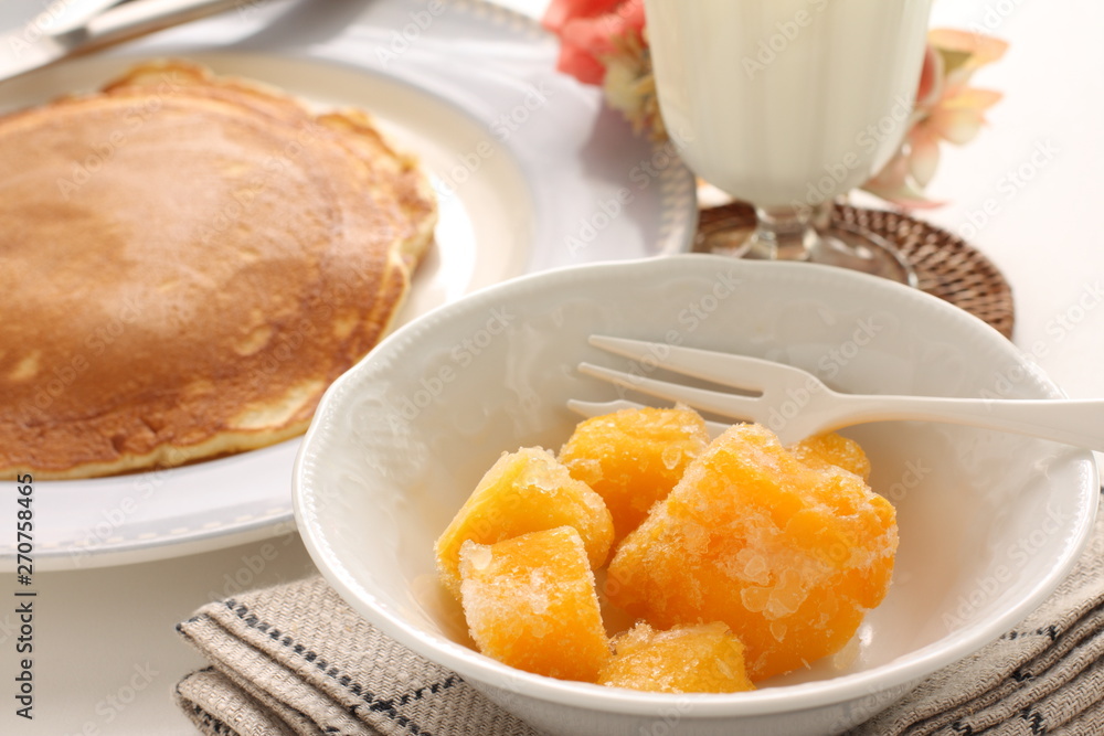 Frozen mango on bowl fro healthy breakfast image Frozen mango on bowl fro healthy breakfast image