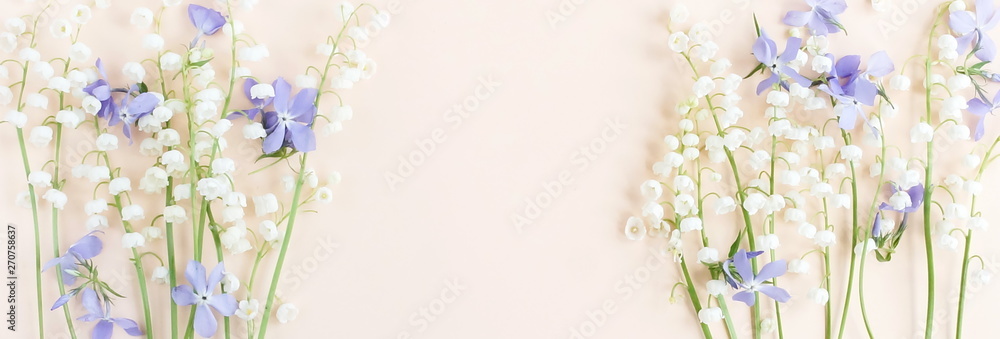 Banner Floral pattern of a spring flowers Lily of the Valley Bouquet  on a pale pink background. top view. flat lay. Holiday concept. Copy space