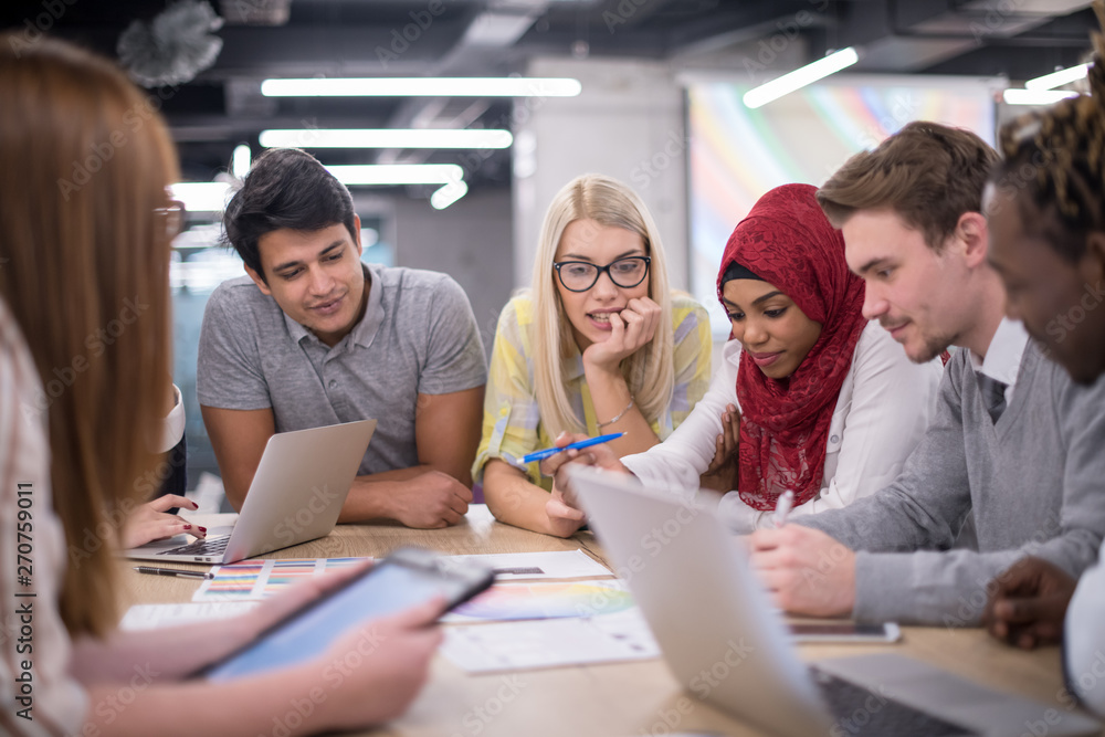 Multiethnic startup business team having meeting Multiethnic startup business team having meeting