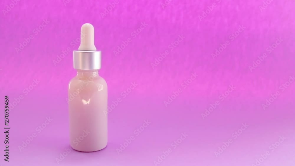 Glass bottle with a natural component of serum for skin care. Youth and beauty. Glass bottle with a natural component of serum for skin care. Youth and beauty.