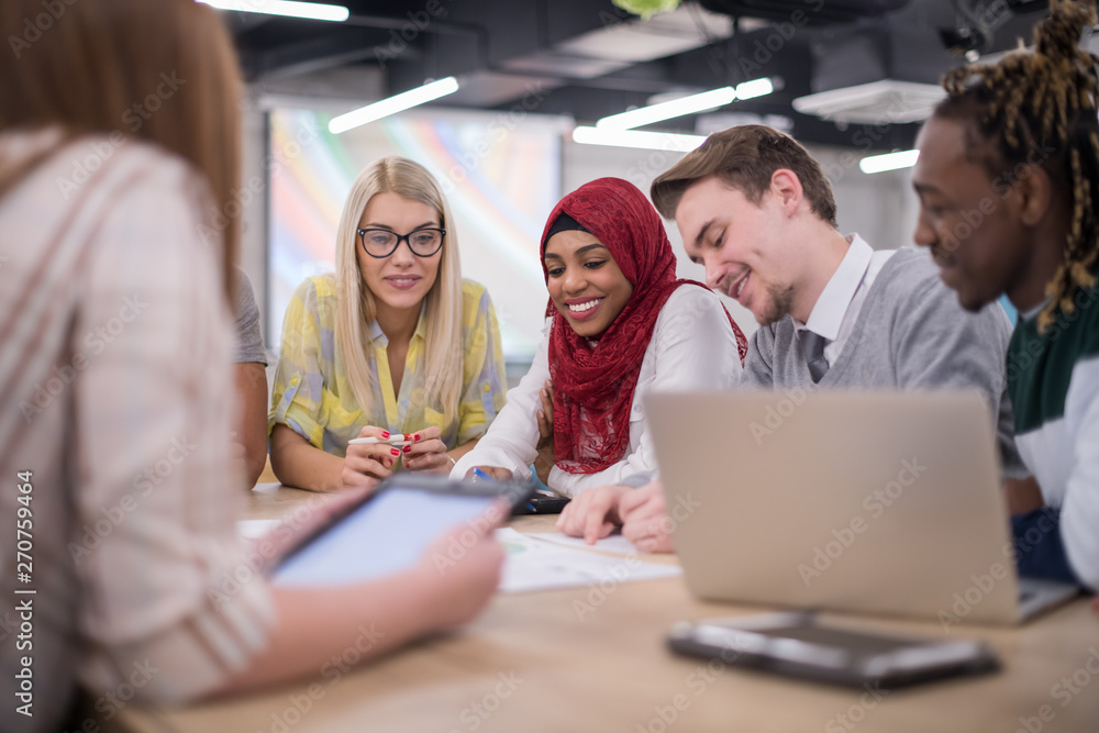 Multiethnic startup business team having meeting Multiethnic startup business team having meeting