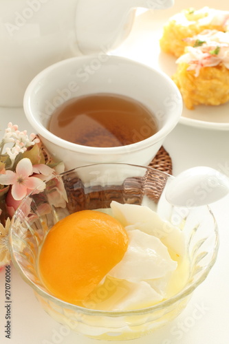 Peach and Almond tofu and Chinese tea image
