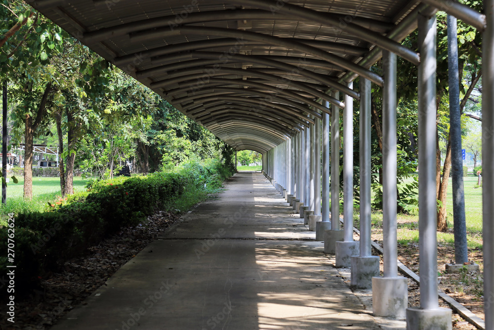 Long empty walkway metal structure background. Long empty walkway metal structure background.