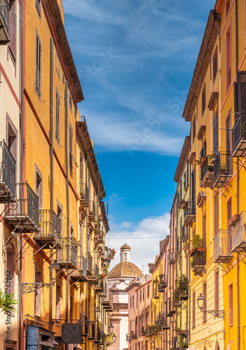 Colorful houses and narrow alleys in Bosa, province of Oristano, a picturesque village of ancient origins, Sardinia, Italy.