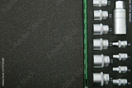 Obraz na płótnie template of socket wrenches in a case with foam rubber with copy space