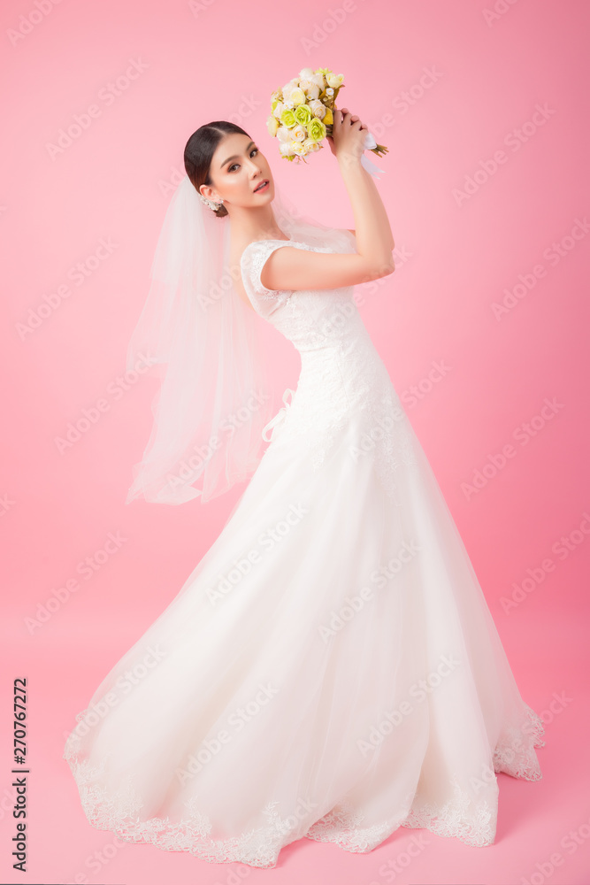 Beautiful asian bride portrait in pink studio Beautiful asian bride portrait in pink studio