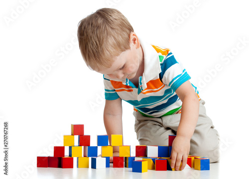 kid toddler plays wooden to...