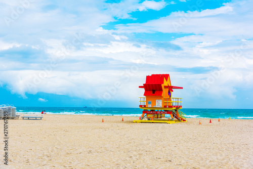Red and orange lifeguard tower in Miami Beach