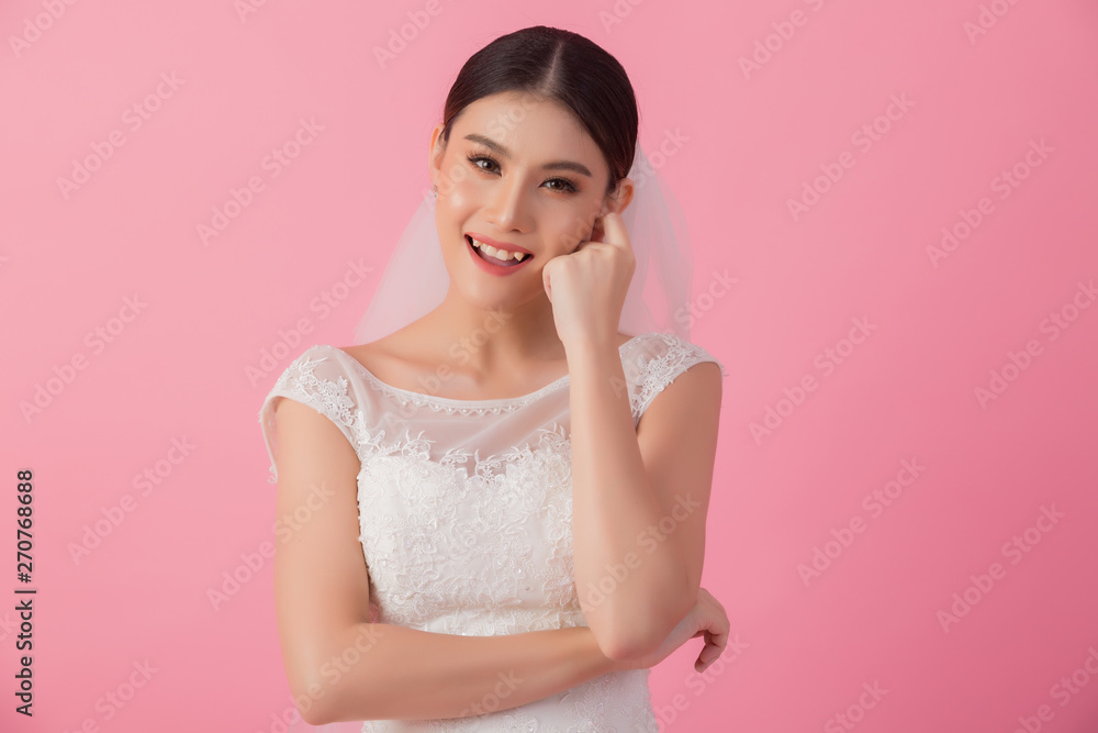 Beautiful asian bride portrait in pink studio Beautiful asian bride portrait in pink studio