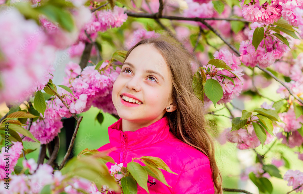 blossom smell, allergy. small girl in spring flower bloom. skincare spa. Natural cosmetics for skin. happy girl in cherry flower. Sakura tree blooming. summer holiday. Childhood beauty. Time to relax blossom smell, allergy. small girl in spring flower bloom. skincare spa. Natural cosmetics for skin. happy girl in cherry flower. Sakura tree blooming. summer holiday. Childhood beauty. Time to relax