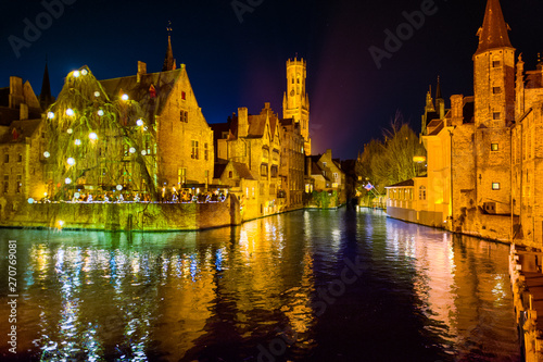 Overview over the Dijver and looking out onto the belfort and the Huidevettershuis, from the classic photospot in Central Bruge.