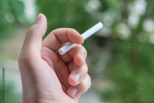 A man smoke the cigarette 
