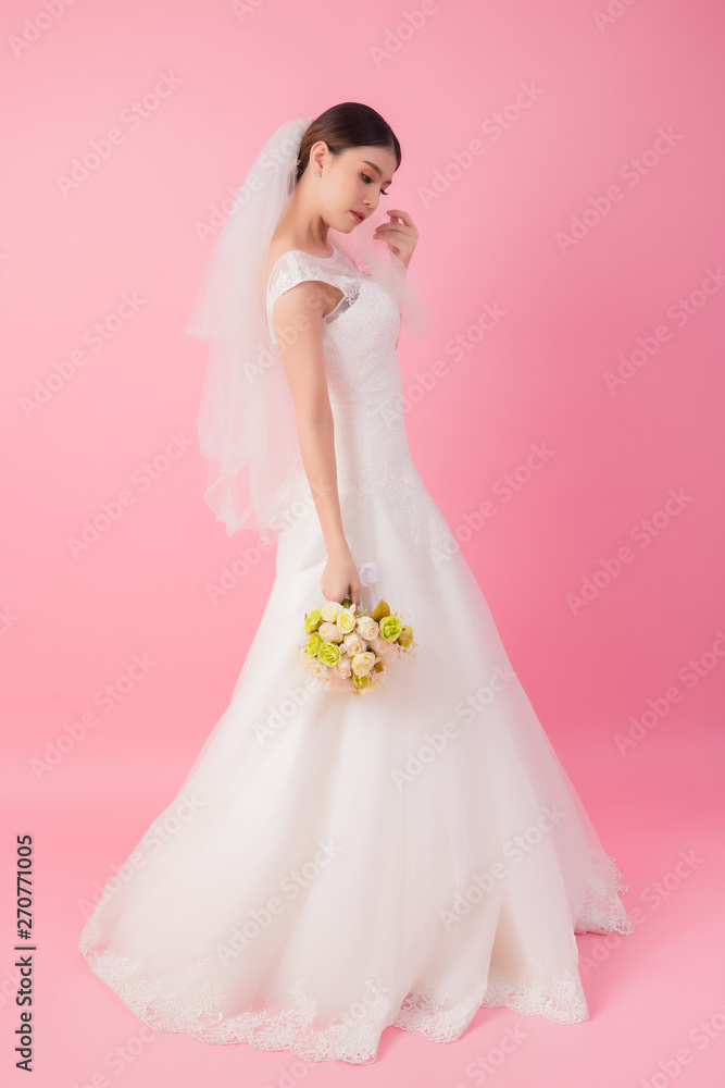 Beautiful asian bride portrait in pink studio Beautiful asian bride portrait in pink studio