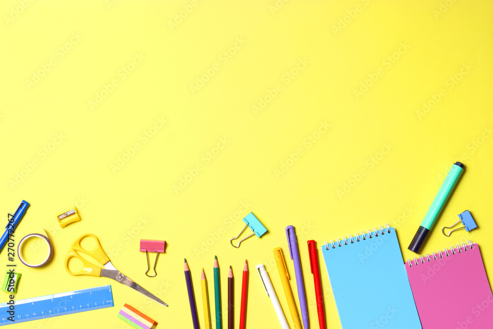 Fototapeta premium School office on a colored background top view. Office office, student office. Concept back to school. place for text. Flatlay
