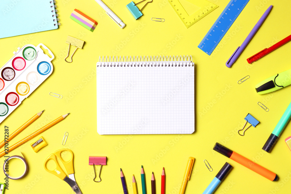 School office on a colored background top view. Office office, student office. Concept back to school. place for text. Flatlay