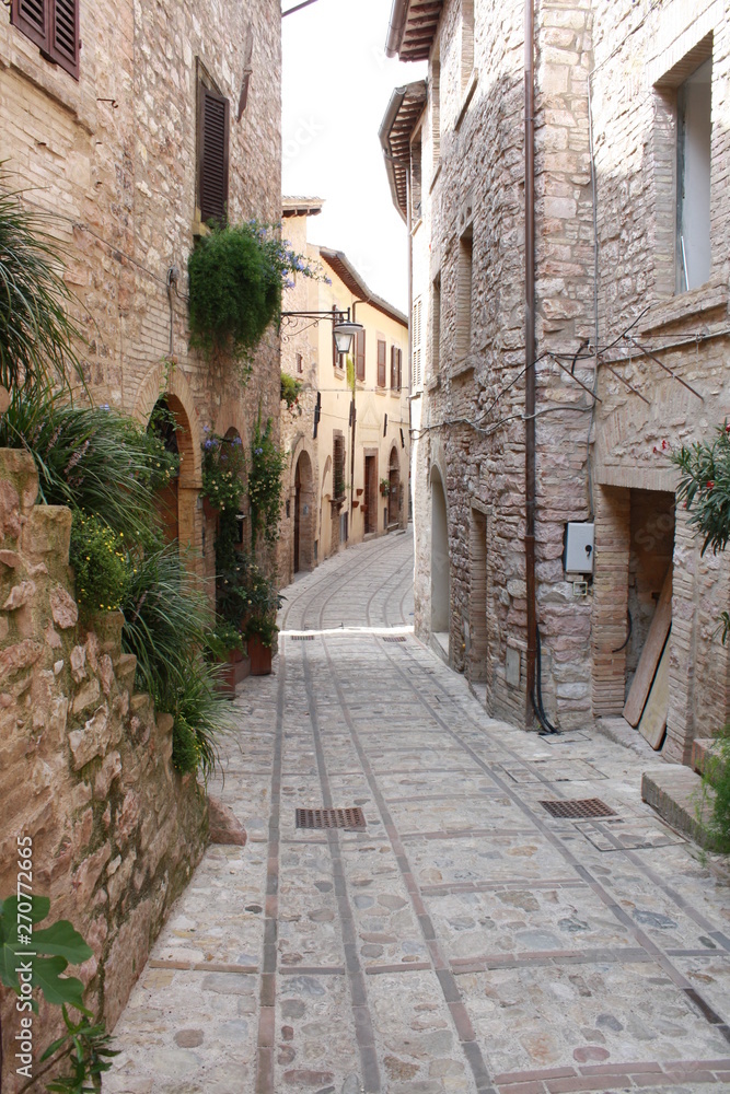 Small medieval alley in Spello city  Umbria Italy