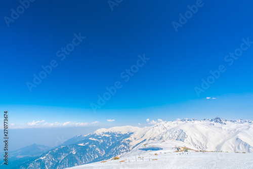 Beautiful  snow covered mountains landscape Kashmir state, India . © jannoon028