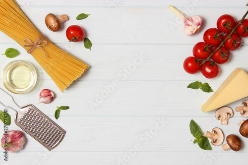 set of products for cooking Italian pasta top view, place for text