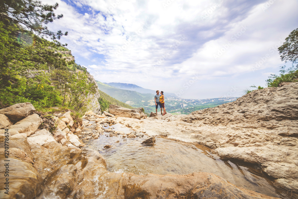 Couple in love travel photo in mountains.