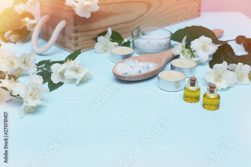 Aromatic oils  sea salt  candles and jasmine flowers. Spa ingredients for massage and relaxation.