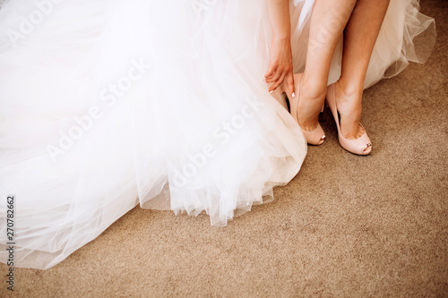 bride in wedding dress shoes. Bridesmaid shoes