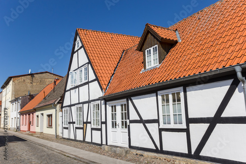 White half timbered house in the old town of Grimmen, Germany