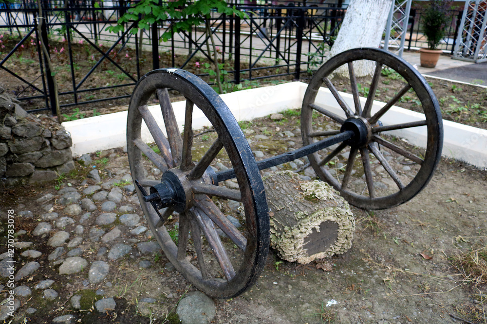 Old wheel in the yard