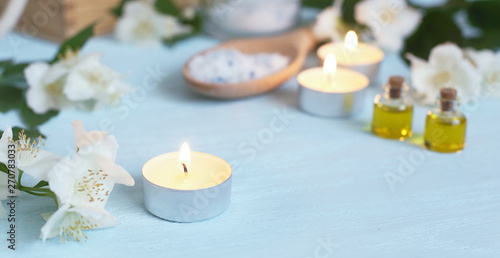 Aromatic oils  sea salt  candles and jasmine flowers. Spa ingredients for massage and relaxation.