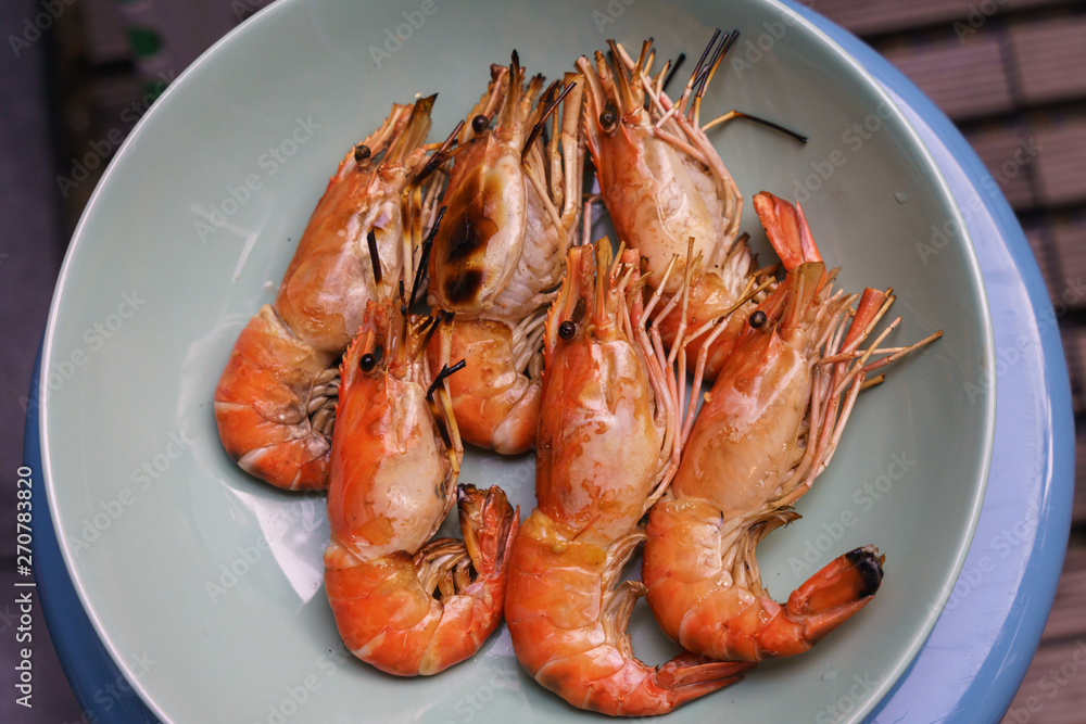 Grilled prawns in the green plat Grilled prawns in the green plat