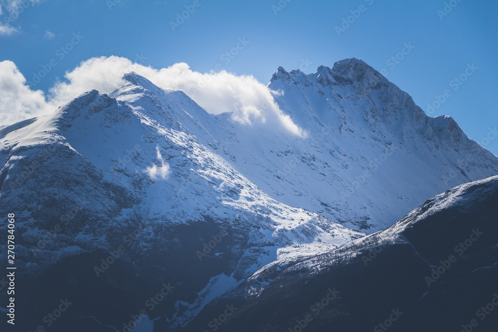Beautiful Romsdal mountains in middle Norway. Snowy tops in springtime. Beautiful Romsdal mountains in middle Norway. Snowy tops in springtime.