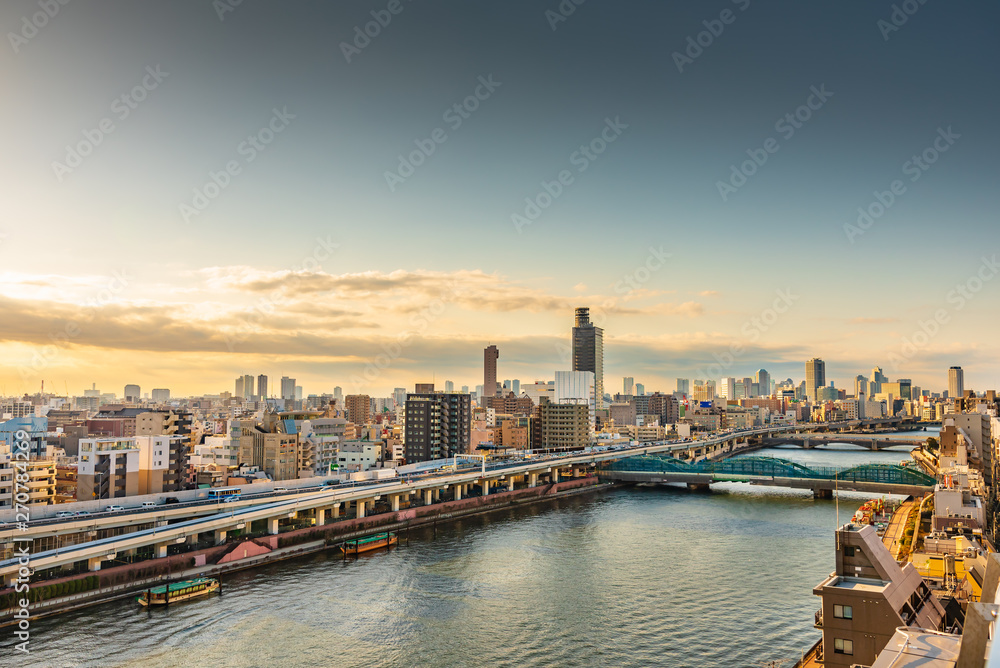 Tokyo skyline, Tokyo city view in sunrise light with Sumida River.