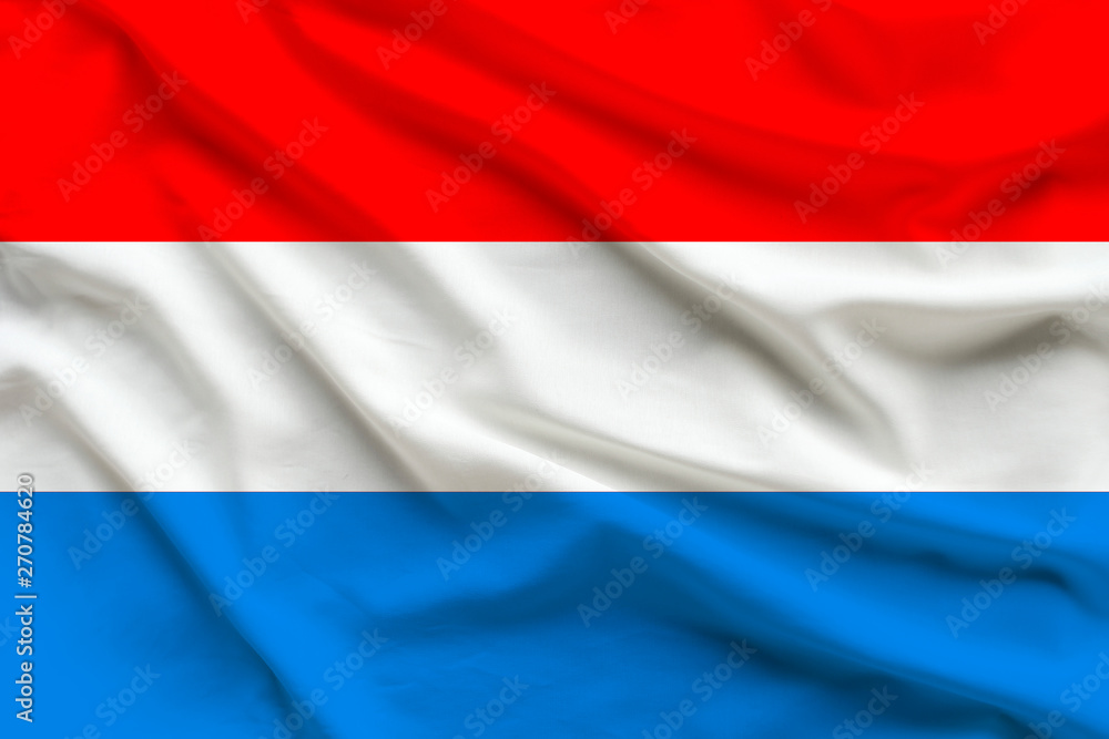 silk national flag of Luxemburg with folds silk national flag of Luxemburg with folds