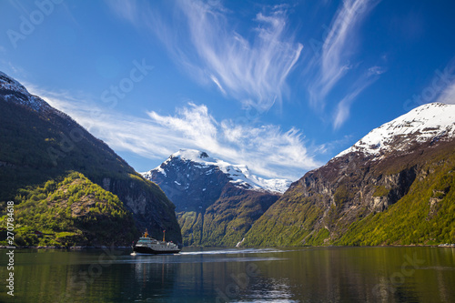 Famous Geiranger fiord in Norway. Spring time beautiful weather and colours.