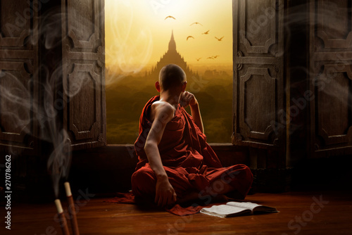 Valokuvatapetti Novice buddhist monk inside a temple in the Bagan Valley