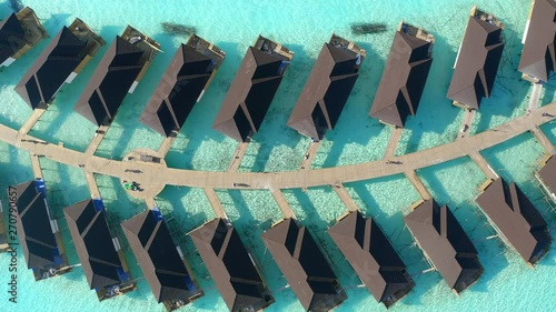 Aerial view, Flight at a Maldives island with water bungalows, South Male Atoll Maldives, Mar 2019 photo