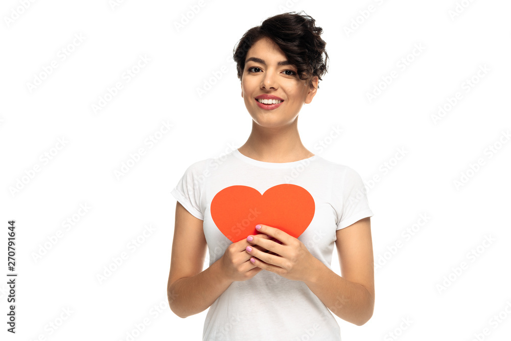 cheerful latin woman holding red heart-shape carton isolated on white cheerful latin woman holding red heart-shape carton isolated on white