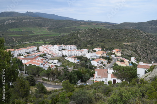 Promenade with beautiful European houses on the shore.