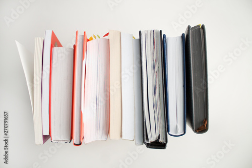 books top view close-up sheets stand in a row