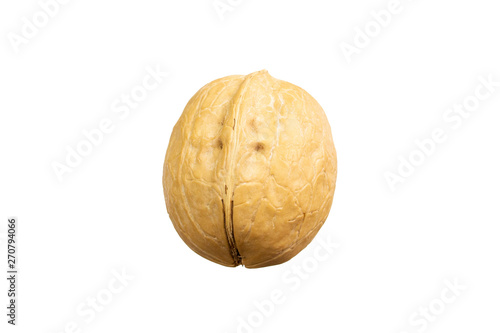 Walnut close-up isolate. The texture of the walnut in the shell. Walnut isolated on white background. With clipping path