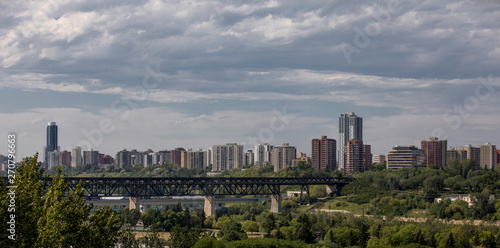 Edmonton, Alberta, Canada -Bridges and Several Skyscrapers of Edmonton downtown at sunset on a cloudy day