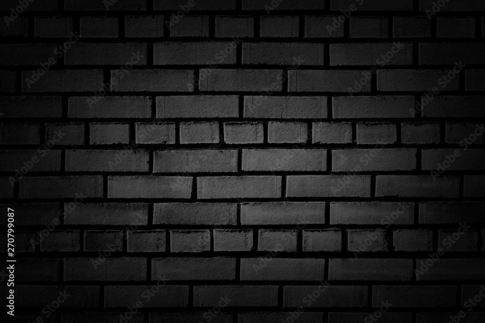 Black, dark grey brick wall texture abstract background