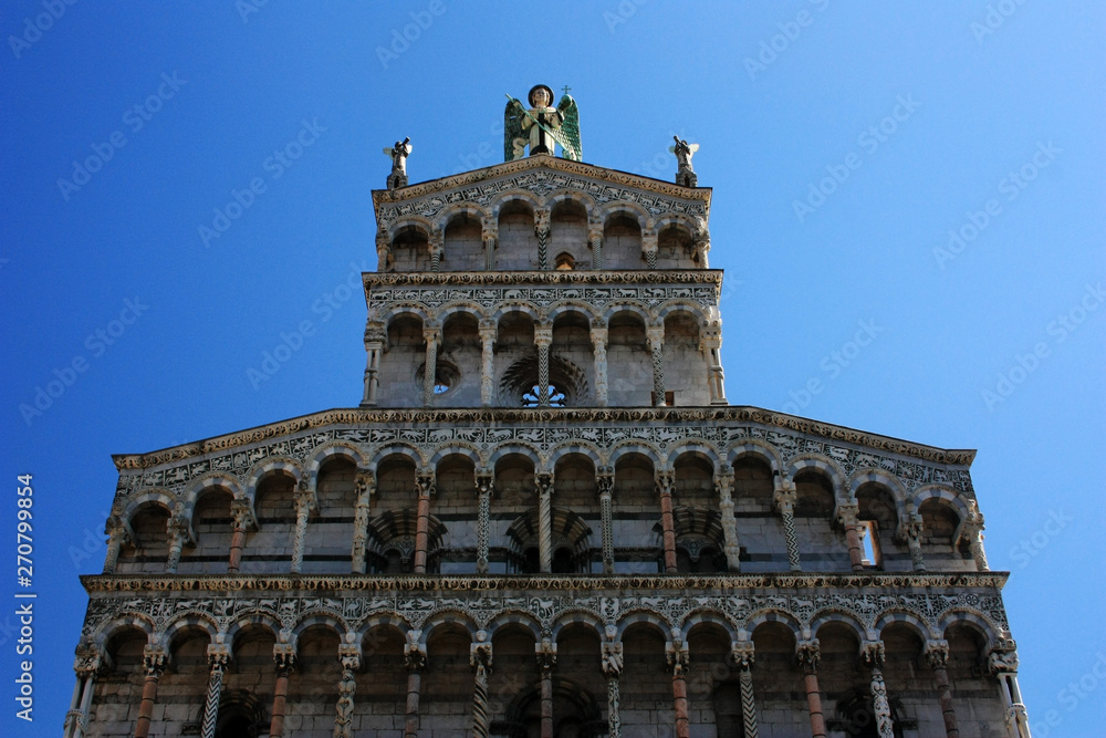 Cathedral with an angel in Lucca, Italy