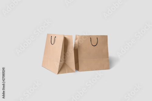 Brown paper Shopping Bags Mock-up isolated on soft gray background.3D rendering.