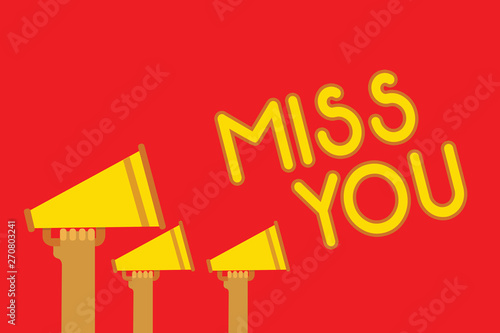 Conceptual hand writing showing Miss You. Business photo showcasing Longing for an important person in your life for a period of time Megaphones loudspeakers loud scream talking speech listen photo