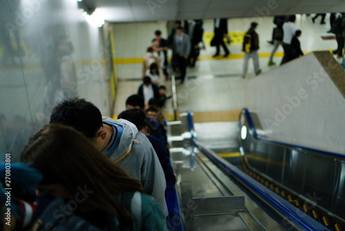 People in an elevator in Tokyo