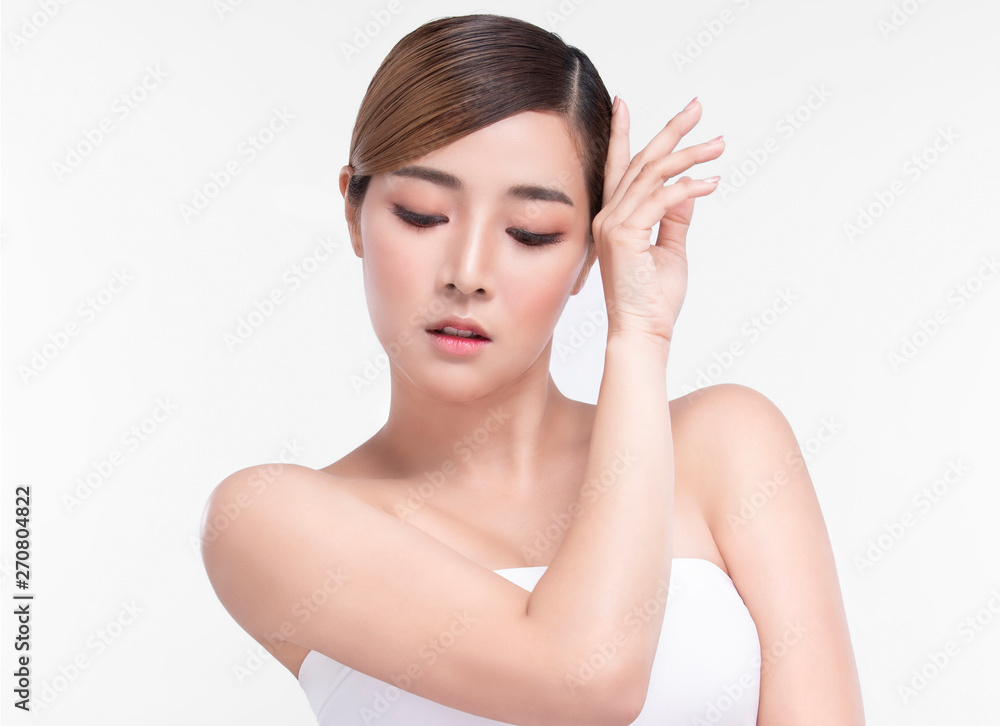Beauty Young asian woman with perfect facial skin. Gestures for advertisement treatment spa and cosmetology. Beauty Young asian woman with perfect facial skin. Gestures for advertisement treatment spa and cosmetology.