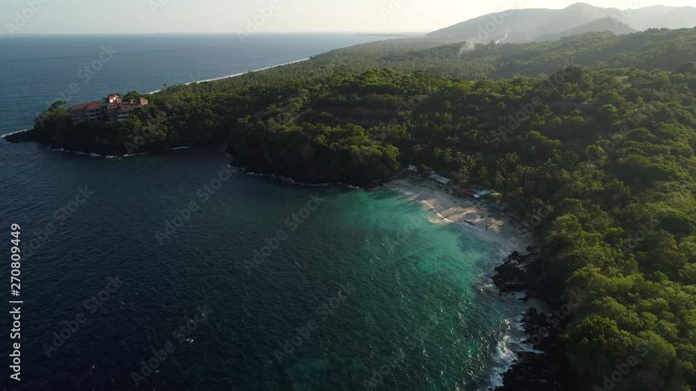 Beautiful Beach on an Island in the Ocean in the Evening Beautiful Beach on an Island in the Ocean in the Evening