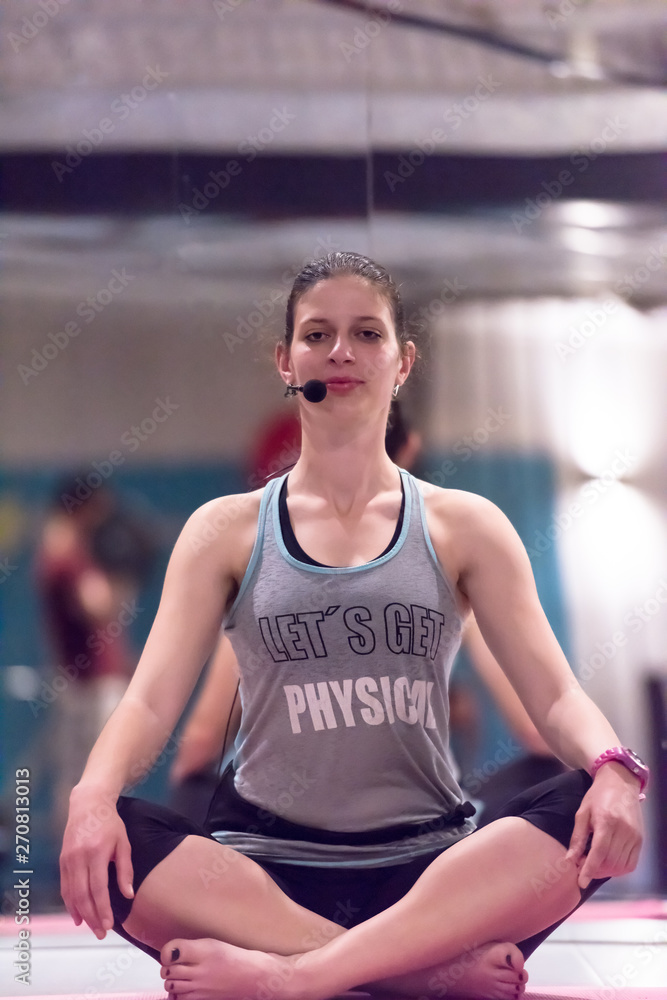 sportswoman doing yoga exercise and meditating sportswoman doing yoga exercise and meditating